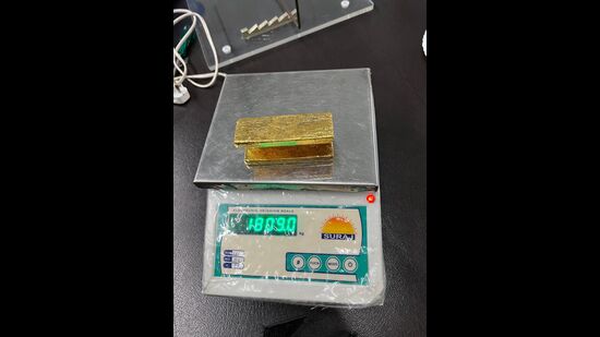 The U-shaped gold bar was affixed under a passenger seat using a Velcro strap. (HT Photo)