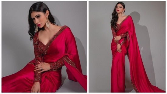 Mouni Roy has lately been making headlines for her role in the film Brahmastra. The graceful Mouni also keeps garnering praises for her praise-worthy outfits. From red carpet wears to traditional fits, the Gold actor can pull out any look effortlessly. In her latest Instagram photos, she can be seen grabbing eyeballs in a red embellished.(Instagram/@imouniroy)