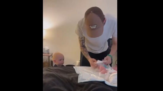 The cute toddler can be seen crying in the video because his baby brother is. (Instagram/@madisonxhooper) The cute toddler can be seen crying in the video because his baby brother is. (Instagram/@madisonxhooper)