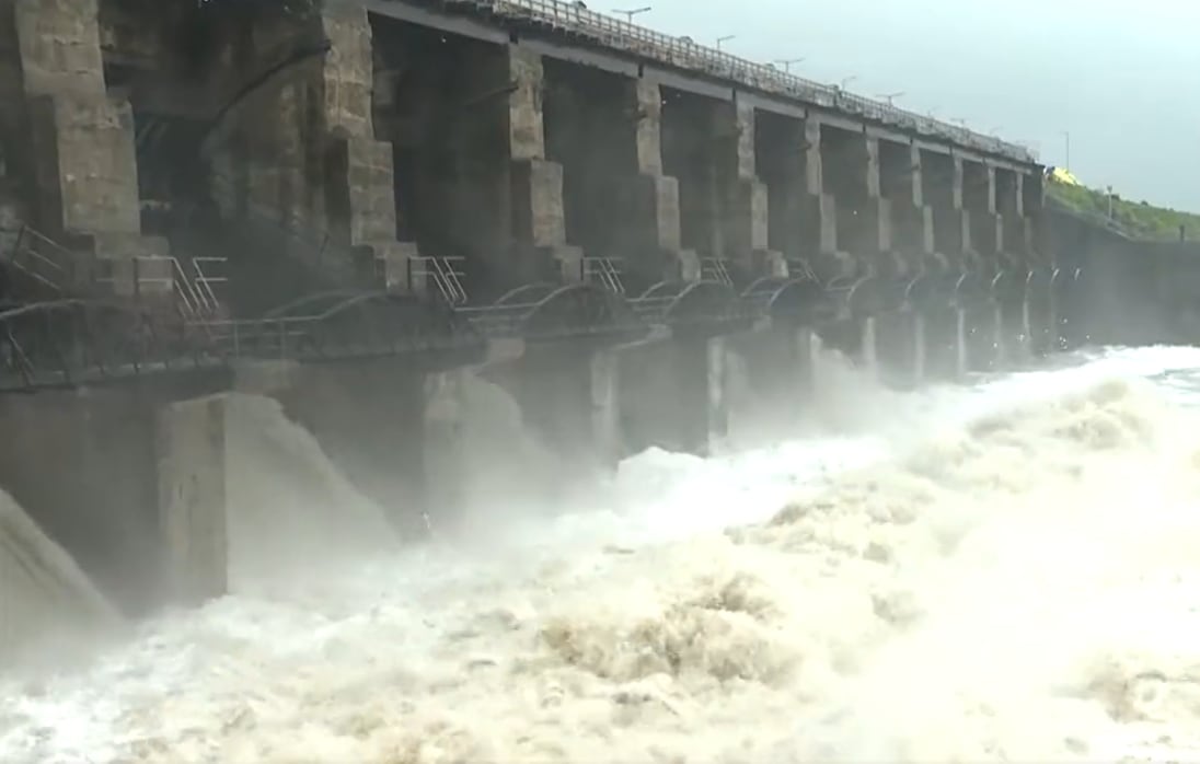 Nyari dam in Rajkot district overflows as heavy downpour lashes the state. Nyari dam in Rajkot district overflows as heavy downpour lashes the state.