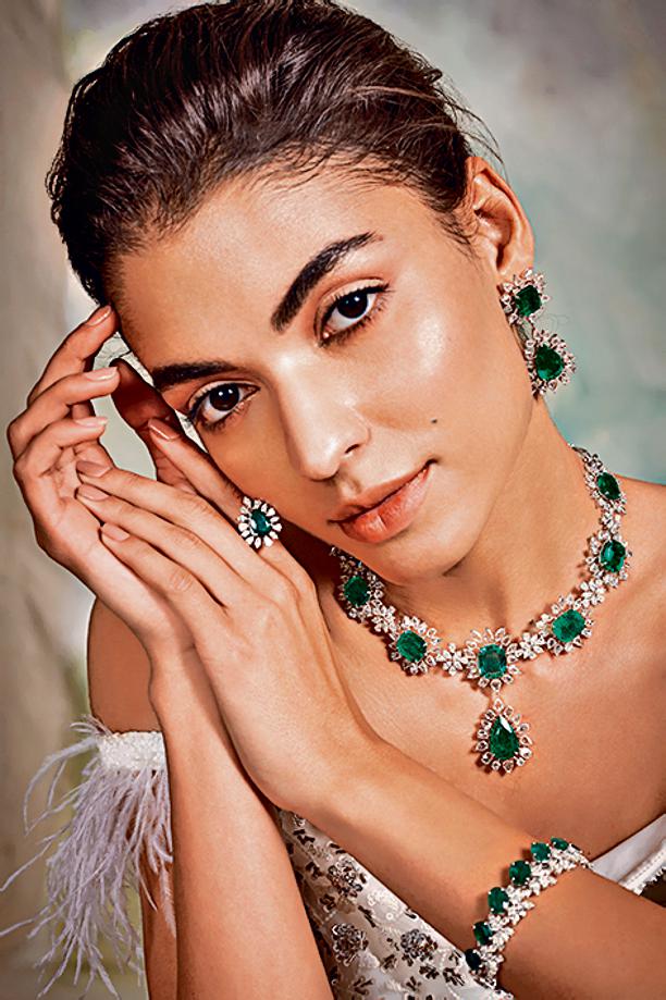 A statement rose cut diamond necklace with Columbian emeralds