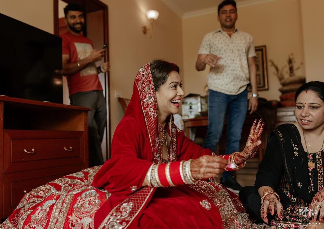 Payal Rohatgi laughing while chatting with her new family.&nbsp;