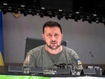 Ukrainian President Volodymyr Zelenskyy speaks via video at an address.