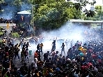 Sri Lanka: Police use tear gas to disperse the protesters who stormed the compound of prime minister Ranil Wickremesinghe 's office.&nbsp;