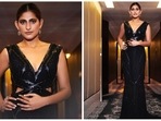 Kubbra Sait's bold roles have made her stand out in more ways than one. She has also garnered a lot of praise for her wardrobe choices which has an amalgamation of all things comfy and glamorous. In her recent photoshoot, the Sacred Games actor donned a dazzling black gown with a floor-sweeping trail.(Instagram/@who_wore_what_when)