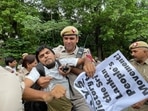 Delhi police detain a youth who was protesting expressing solidarity with Sri Lankan protestors outside Sri Lankan High Commission in New Delhi Delhi police detain a youth who was protesting expressing solidarity with Sri Lankan protestors outside Sri Lankan High Commission in New Delhi