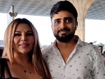 Rakhi Sawant with Adil Khan at Mumbai airport. Rakhi Sawant with Adil Khan at Mumbai airport.