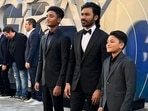 Dhanush with his sons at The Gray Man premiere in Los Angeles on Wednesday.&nbsp;