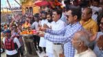 District magistrate Vinay Shankar Pandey and district superintendent Yogendra Singh Rawat with Ganga Sabha president Pradeep Jha performing rituals at Ganga Ghat at Brahamkund, Har-ki-Pauri as Kanwar fair commenced on Thursday in Haridwar. (HT PHOTO.) District magistrate Vinay Shankar Pandey and district superintendent Yogendra Singh Rawat with Ganga Sabha president Pradeep Jha performing rituals at Ganga Ghat at Brahamkund, Har-ki-Pauri as Kanwar fair commenced on Thursday in Haridwar. (HT PHOTO.)