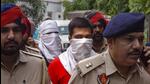Punjab Police personnel produce Ankit Sirsa and Sachin Bhiwani in the Patiala House court in New Delhi on Thursday. (PTI) Punjab Police personnel produce Ankit Sirsa and Sachin Bhiwani in the Patiala House court in New Delhi on Thursday. (PTI)