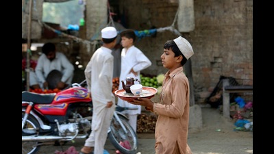 Of human trials and transcendence: A boy at a tea shop in Peshawar, Pakistan. (Mohammad Sajjad/AP) Of human trials and transcendence: A boy at a tea shop in Peshawar, Pakistan. (Mohammad Sajjad/AP)