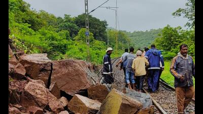 Landslide on railway tracks near Anjani, Khed on Thursday. (Anil Phalke/HT PHOTO)