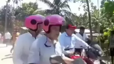 In the video, Assam chief minister Himanta Biswa Sarma is seen riding a scooter. In the video, Assam chief minister Himanta Biswa Sarma is seen riding a scooter. 