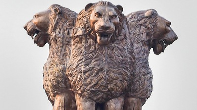 The National Emblem made of bronze on the roof of the new Parliament building was unveiled by PM Modi on July 11. (PTI) The National Emblem made of bronze on the roof of the new Parliament building was unveiled by PM Modi on July 11. (PTI)