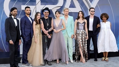Dhanush, Rege-Jean Page, Julia Butters, Billy Bob Thornton, Jessica Henwick, Ryan Gosling, Ana de Armas, Chris Evans, and Alfre Woodard attended the world premiere of The Gray Man on Wednesday. The film will release on Netflix on July 15. (Getty Images/AFP) (AFP) Dhanush, Rege-Jean Page, Julia Butters, Billy Bob Thornton, Jessica Henwick, Ryan Gosling, Ana de Armas, Chris Evans, and Alfre Woodard attended the world premiere of The Gray Man on Wednesday. The film will release on Netflix on July 15. (Getty Images/AFP) (AFP)