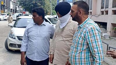 Harmeet Singh, junior assistant at Ludhiana Improvement Trust, in the vigilance custody on Thursday. (HT Photo)
