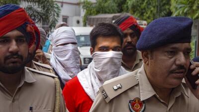 Punjab Police personnel produce Ankit Sirsa and Sachin Bhiwani in the Patiala House court in New Delhi on Thursday. (PTI) Punjab Police personnel produce Ankit Sirsa and Sachin Bhiwani in the Patiala House court in New Delhi on Thursday. (PTI)