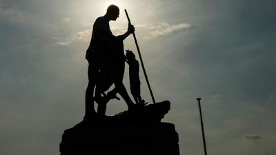 A worker cleans a statue of Mahatma Gandhi at Marina Beach in Chennai. (Used for Representation). (AFP) A worker cleans a statue of Mahatma Gandhi at Marina Beach in Chennai. (Used for Representation). (AFP)