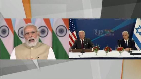(From left) Prime Minister Narendra Modi addresses the ‘I2U2 Summit’ via video conferencing in the presence of US President Joe Biden and Israeli PM Yair Lapid on Thursday. (Twitter) (From left) Prime Minister Narendra Modi addresses the ‘I2U2 Summit’ via video conferencing in the presence of US President Joe Biden and Israeli PM Yair Lapid on Thursday. (Twitter)