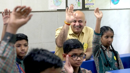 Delhi Deputy Chief Minister Manish Sisodia in the happiness class during the launch of 'Happiness Utsav 2022', at Kautilya Govt Sarvodaya Bal Vidyalaya, in New Delhi on Thursday. (ANI Photo) Delhi Deputy Chief Minister Manish Sisodia in the happiness class during the launch of 'Happiness Utsav 2022', at Kautilya Govt Sarvodaya Bal Vidyalaya, in New Delhi on Thursday. (ANI Photo)