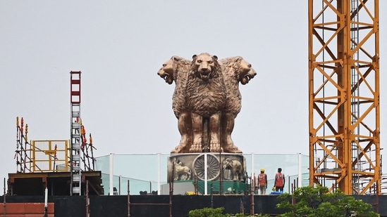 The new National Emblem is at the centre of the controversy owing to its different look which, artists say, is because of the height. 