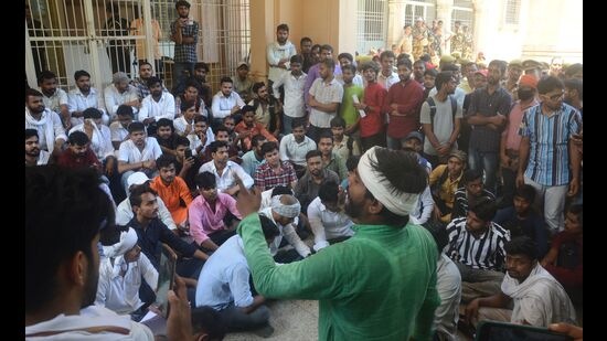 Students staging a protest at AU on Thursday. (HT) Students staging a protest at AU on Thursday. (HT)