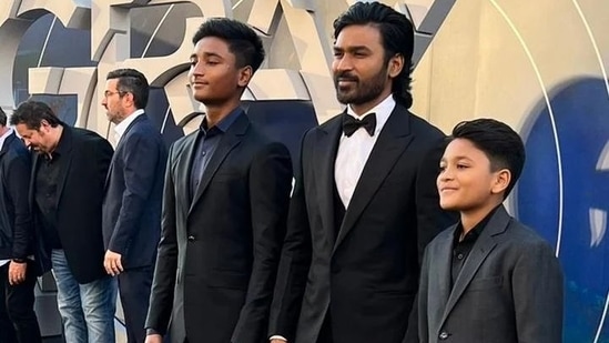 Dhanush with his sons at The Gray Man premiere in Los Angeles on Wednesday.&nbsp;