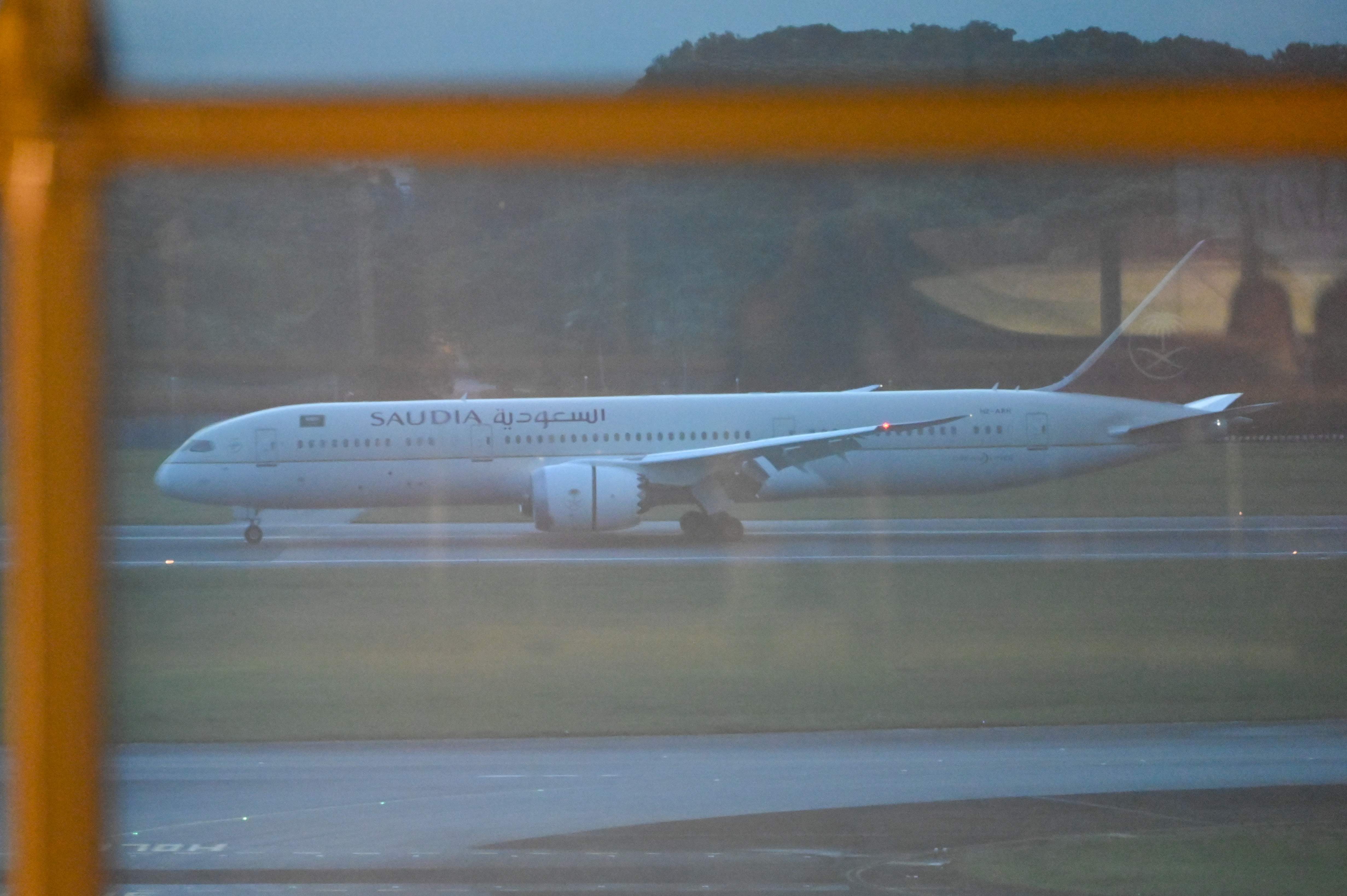 A Saudia airline Boeing 787 Dreamliner believed to be carrying Sri Lanka's president Gotabaya Rajapaksa, his wife and two bodyguards arrives at Changi International Airport. (AFP)