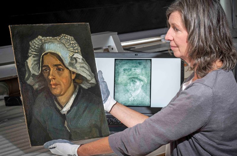 Van Gogh's self-portrait detected under cardboard and layers of glue and Head of a Peasant Woman by Vincent Van Gogh are displayed, in Edinburgh, Scotland, Great Britain. (Neil Hanna/Handout via REUTERS)