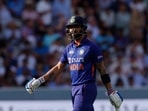 India's Virat Kohli walks after being caught out by England's Jos Buttler&nbsp;