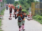 Kanwariyas arriving in Uttarakhand’s Haridwar from neighbouring states. (HT Photo)