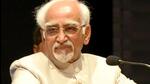 BJP slams Ansari, releases photo with Pakistan journalist BJP slams Ansari, releases photo with Pakistan journalist