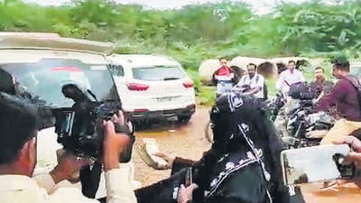 A family member of one of the four injured persons in the Kerur violence on Friday threw back ₹2 lakh given by former chief minister and senior Congress leader Siddaramaiah, demanding justice for the incident. (PTI) A family member of one of the four injured persons in the Kerur violence on Friday threw back ₹2 lakh given by former chief minister and senior Congress leader Siddaramaiah, demanding justice for the incident. (PTI)