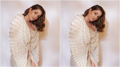 "Sparkle," Hina aptly captioned her pictures as she posed against a white backdrop. (Instagram/@realhinakhan)