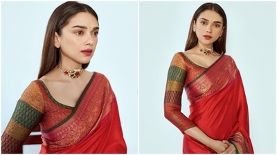 Aditi Rao Hydari redefined elegance in this gorgeous red Banarasi silk saree which she teamed with a multi-coloured blouse. (Instagram/@aditiraohydari) Aditi Rao Hydari redefined elegance in this gorgeous red Banarasi silk saree which she teamed with a multi-coloured blouse. (Instagram/@aditiraohydari)
