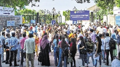 Examinees outside a CUET-UG centre at North Campus in New Delhi on Friday. (Amal KS/HT Photo)