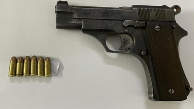 One country made gun and six rounds of live ammunition seized from two people in Bengaluru (Twitter) One country made gun and six rounds of live ammunition seized from two people in Bengaluru (Twitter)