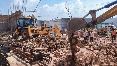 Rescue operation underway to save people trapped under debris following the collapse of a wall in an under-construction godown, at Alipur area in New Delhi, Friday, July 15, 2022. Rescue operation underway to save people trapped under debris following the collapse of a wall in an under-construction godown, at Alipur area in New Delhi, Friday, July 15, 2022. 