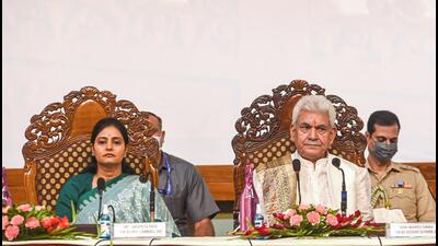 Jammu and Kashmir Lt Governor Manoj Sinha and Union MoS for commerce and industry Anupriya Patel during an event in Srinagar on Friday. (PTI) Jammu and Kashmir Lt Governor Manoj Sinha and Union MoS for commerce and industry Anupriya Patel during an event in Srinagar on Friday. (PTI)