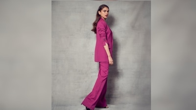 Aditi Rao Hydari elevated her look by teaming her pantsuit with a matching coloured crop top and black strappy stilettoes. (Instagram/@aditiraohydari) Aditi Rao Hydari elevated her look by teaming her pantsuit with a matching coloured crop top and black strappy stilettoes. (Instagram/@aditiraohydari)