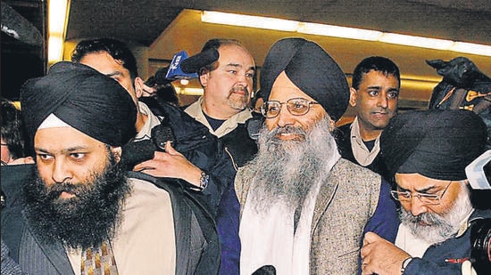 Sikh community leader Ripudaman Singh Malik (centre) was shot dead in Surrey, British Columbia, on Thursday. (Reuters)