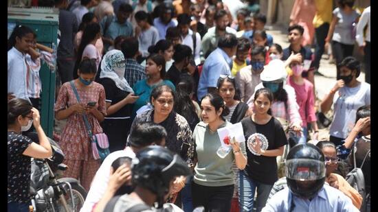 Candidates leave an exam centre in Lucknow after appearing for the Common University Entrance Test for undergraduate admissions, on Friday. Many candidates complained that they were allotted centres far off from their city. (Deepak Gupta/HT Photo)