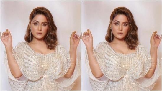 Hina wore an off-white gown that came intricately detailed in silver resham threads and decorations. The gown featured a sweetheart neckline and cascaded with bodycon details to her feet.(Instagram/@realhinakhan)