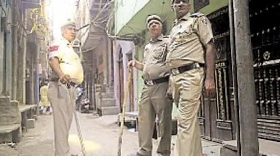 Delhi Police personnel outside the residence of the man who shot his wife and daughters and killed himself in Jaffrabad. (HT PHOTO) Delhi Police personnel outside the residence of the man who shot his wife and daughters and killed himself in Jaffrabad. (HT PHOTO)