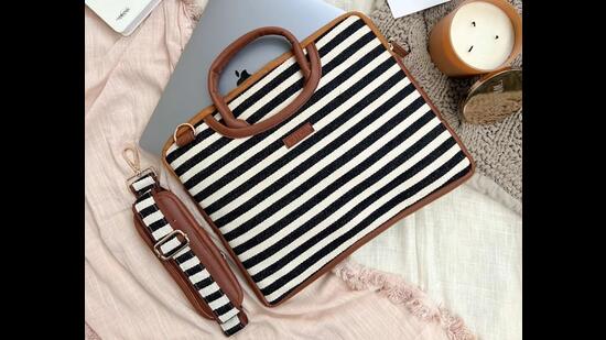 For a casual social, carry a sleeve that doubles up as a bag to place your essentials into (Buttercream chevron sustainable laptop sleeve and bag by Maisha Lifestyle) For a casual social, carry a sleeve that doubles up as a bag to place your essentials into (Buttercream chevron sustainable laptop sleeve and bag by Maisha Lifestyle)