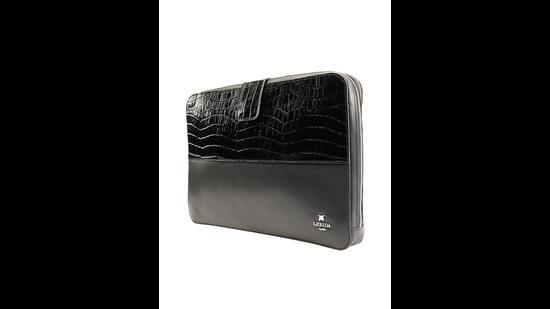 Carry a sharp looking laptop sleeve that’s dressy enough for a work meeting. (Dual textured sleek leather laptop sleeve by Lerida on Roperro) Carry a sharp looking laptop sleeve that’s dressy enough for a work meeting. (Dual textured sleek leather laptop sleeve by Lerida on Roperro)