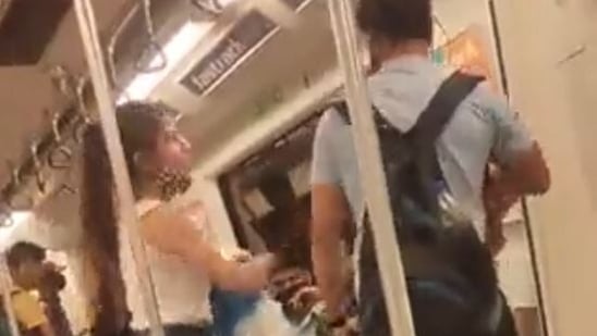 Screenshot from the viral video of a girl slapping a boy inside the coach.&nbsp;