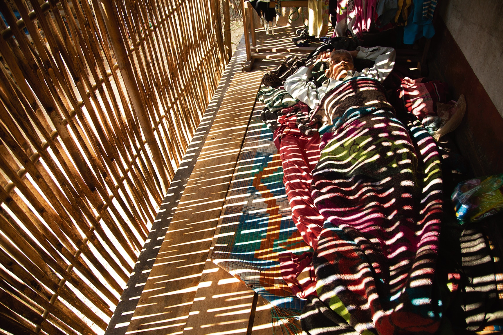 Goijuru Toto in his traditional bamboo dwelling. Homes are now also being built of brick and concrete. (Abhijit AA / Totos of Totopara) Goijuru Toto in his traditional bamboo dwelling. Homes are now also being built of brick and concrete. (Abhijit AA / Totos of Totopara)