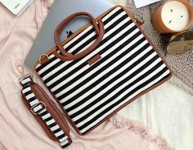 For a casual social, carry a sleeve that doubles up as a bag to place your essentials into (Buttercream chevron sustainable laptop sleeve and bag by Maisha Lifestyle)
