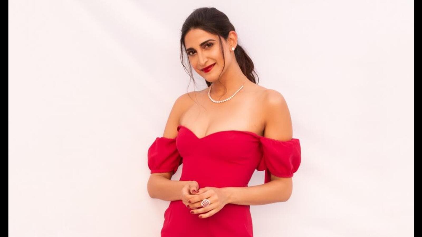 Aahana Kumra Is A Flamboyant Fashionista In Her Sheer Orange Dress